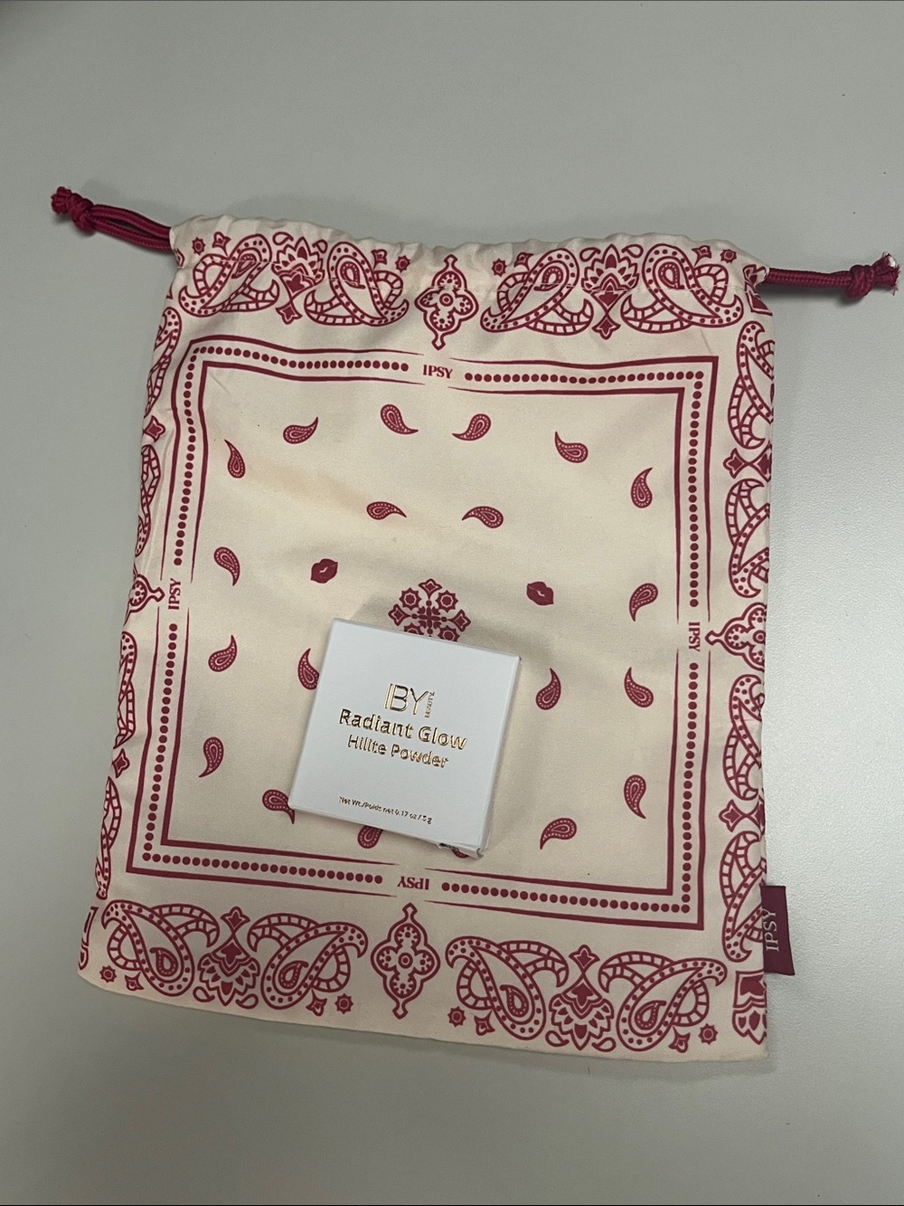 IBY Radiant Glow Hilite Powder — Pink and Burgundy Cosmetic bag